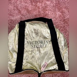 Victoria’s Secret gold foil collapsible “IT” Bag